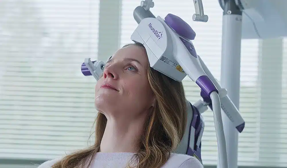 Patient resting comfortably during a NeuroStar TMS treatment session